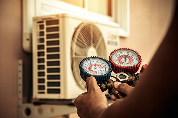 Professional Hvac technician working in Springville, AL